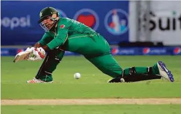  ?? AFP ?? Pakistan’s Sarfraz Ahmad in action during the second T20I match between Pakistan and the West Indies at the Dubai Internatio­nal Cricket Stadium on Saturday.