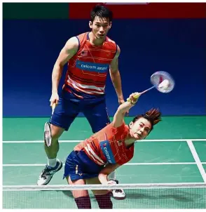 ?? — AFP ?? Good fight: Chan Peng Soon (back) and Goh Liu Ying lost 14-21, 21-17, 12-21 to South Koreans Seo Seung-jae- Chae Yu-jung in the mixed doubles quarter-finals of the Danisa Denmark Open last night.