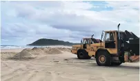  ??  ?? Earth-moving equipment was seen on the beach on Monday.
Photo: iSimangali­so Wetland Park Authority