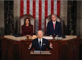  ?? ANDREW CABALLERO-REYNOLDS — AFP VIA GETTY IMAGES/TNS ?? US Vice President Kamala Harris and US Speaker of the House Kevin Mccarthy (R-CA) listen as US President Joe Biden delivers the State of the Union address in the House Chamber of the US Capitol in Washington, DC, on Tuesday.