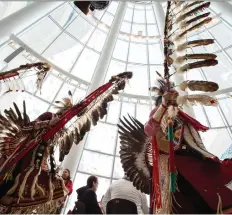  ?? BRANDON HARDER ?? Dancers take part in the grand entry of a signing ceremony for the creation of the Red Dog urban reserve at First Nations University.