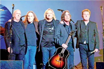  ??  ?? (Left to right ) Bernie Leadon, Timothy B. Schmit, Joe Walsh and Don Henley of The Eagles perform with Jackson Browne during The 58th Grammy Awards at Staples Center on Feb. 15, 2016 in Los Angeles.