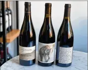  ?? KRISTA SLATER FOR THE AJC ?? You can find syrah (also known as shiraz) in almost every wine-growing region in the world. This full-bodied red is a cozy companion on chilly nights and pairs well with food.