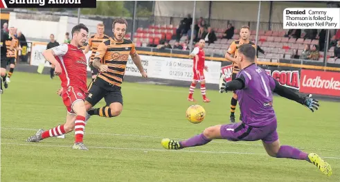  ??  ?? Denied Cammy Thomson is foiled by Alloa keeper Neil Parry