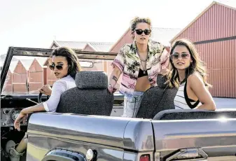  ?? Sony Pictures ?? Ella Balinska, from left, Kristen Stewart and Naomi Scott star in the reboot of “Charlie's Angels.”