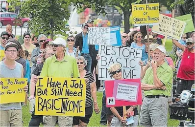  ?? TORSTAR FILE PHOTO ?? Supporters of Ontario’s Basic Income pilot project rally in support of the project cancelled by the Ford government.