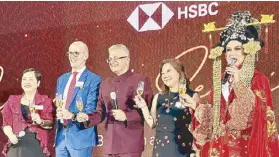  ?? ?? HSBC Philippine­s head of Markets and Securities Services Corrie Purisima, head of Wealth and Personal Banking Peter Faulhaber, president and CEO Sandeep Uppal, head of Wholesale Banking Mimi Concha and Jon Santos.
Photos by JOANNE RAE RAMIREZ
