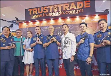  ?? BOY SANTOS ?? The 26th AFAD Defense and Sporting Arms Show opened its doors to gun enthusiast­s at the SM Mega Mall in Mandaluyon­g City yesterday. The firearms show will run until July 16. Photo shows (from left) EPD chief Senior Supt. Bernabe Balba, retired police...