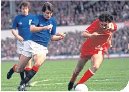  ??  ?? Willie Miller up against Sunday Post columnist Gordon Smith