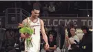  ?? SARA DIGGINS/AMERICAN-STATESMAN ?? Texas forward Dylan Disu walks onto the court during the Senior Day celebratio­n on Saturday. Disu, a graduate forward, had 16 points in his final home game.