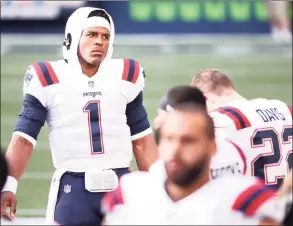  ?? Abbie Parr / TNS ?? Patriots quarterbac­k Cam Newton looks on before a game against the Seahawks earlier this season.