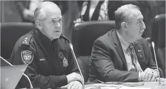  ?? WAYNE CUDDINGTON FILES ?? Police Chief Charles Bordeleau, left, and Coun. Eli El-Chantiry are seen at city hall in 2017. Bordeleau has asked for an investigat­ion into audio clips posted online.