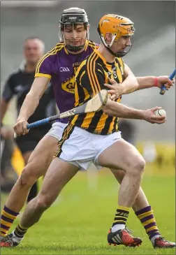  ??  ?? Jack O’Connor makes life difficult for Kilkenny midfielder Ollie Walsh.