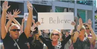  ??  ?? Protesters against Judge Brett Kavanaugh shout during a rally Sept. 27 in Salt Lake City. Some worry Congress has lost its urgency toward improving itself as a workplace and holding powerful men accountabl­e for sexual assault and harassment.