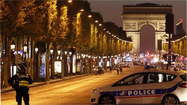  ??  ?? LOOMING VOTE: Clockwise from bottom left: presidenti­al candidates Francois Fillon; Marine Le Pen; the Champs-Elysees after the lockdown last week following the Islamist attack in which a French police officer was murdered; hopefuls Emmanuel Macron; and...