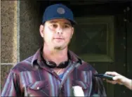  ?? THE ASSOCIATED PRESS ?? Jason Freeman, Charles Manson’s purported grandson, speaks to reporters outside court in Los Angeles on Friday.