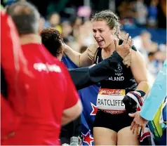  ?? PHOTOSPORT ?? Julia Ratcliffe won gold in the hammer throw, but TVNZ missed most of her event.