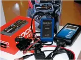  ??  ?? Changing a battery these days can demand tools such as these devices from Ecobat to maintain integrity of the car’s electronic­s.