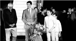  ??  ?? Justin Trudeau, along with his wife and three children, arriving in Delhi on Saturday