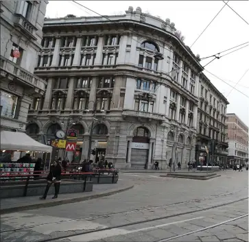  ??  ?? This would normally be a street bustling with people, but Milan city centre was nearly empty yesterday as Prime Minister Giuseppe Conte announced a ‘national emergency’ due to the coronaviru­s outbreak