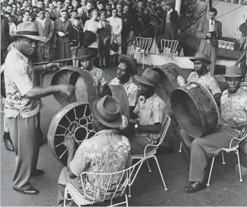  ??  ?? The Trinidad All Steel Percussion Orchestra gives its first public performanc­e in London at the South Bank 'xhibition, prompting “a wave of admiration for Caribbean music”