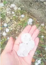  ??  ?? FREAK STORM Hailstones the size of golf balls