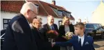  ?? (Shlomo Zach/GPO) ?? PRESIDENT REUVEN RIVLIN and Danish Prime Minister Lars Lokke Rasmussen, and their wives, are greeted with flowers upon their arrival in Gilleleje.