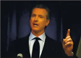  ?? FILE PHOTO — GETTY IMAGES ?? Gov. Gavin Newsom’s administra­tion announced changes late Wednesday night to California’s tiered reopening system that will make it easier for businesses to reopen and increase pressure on school districts to bring kids back to campus.