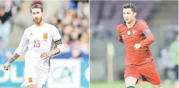  ??  ?? File photo shows Spain’s Sergio Ramos (left) and Portugal’s Cristiano Ronaldo. European champions Portugal face 2010 World Cup winners Spain in their first Group B fixture in Sochi on Saturday at 2am (Malaysian time). — AFP photo