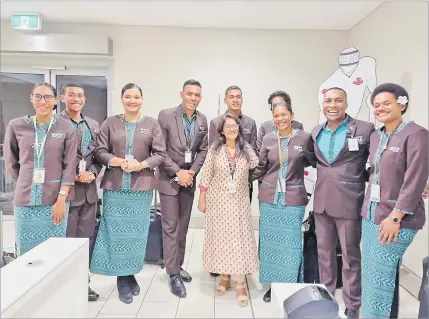  ?? Picture: TALEBULA KATE ?? Members of the crew for the inaugural flight to Vancouver with Shaenaz Voss, Fiji Airways Executive
General Corporate Affairs.