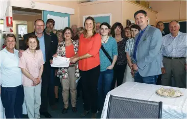  ??  ?? Member for Narracan Gary Blackwood (third left) receives a petition to be presented to parliament this week calling for the retention of the former Hill End school as a community centre from Hill End Community Inc’s Chris Williams and a past president...