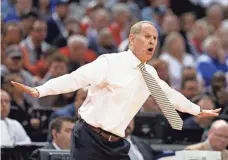  ?? BRIAN SPURLOCK, USA TODAY SPORTS ?? “There’s always going to be a lot of hype about what teams are getting most hype early, and it just doesn’t go away,” Michigan coach John Beilein said after Sunday’s win against Louisville.