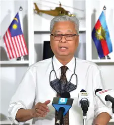  ?? — Bernama photo ?? Ismail Sabri updates the Movement Control Order during his daily press conference at the Defence Ministry.