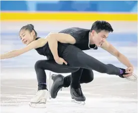  ??  ?? North Korea’s Ryom Tae Ok, left, and Kim Ju Sik perform during training.