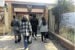  ?? / THULANI MBELE ?? Freedom Park Secondary School teachers seeking protection from their principal appear in court.