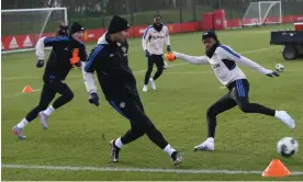  ?? Photograph: John Peters/Manchester United/Getty Images ?? Casemiro plays a pass beyond Fred during training before the first leg of the Carabao Cup semi-final against Nottingham Forest.