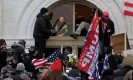  ?? 2021. Photograph: Leah Millis/Reuters ?? A mob of Trump supporters climb through a window they broke as they storm the US Capitol in Washington on 6 January