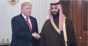  ??  ?? الرئيس األمريكي في استقبال األمير محمد بن سلمان.