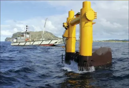  ?? THE ASSOCIATED PRESS ?? The Azura wave energy device converts the movement of waves into electricit­y at the Navy’s Wave Energy Test Site at the Marine Corps base at Kaneohe Bay on Oahu in Hawaii.