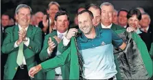  ?? [JEFF SINER/CHARLOTTE OBSERVER] ?? Sergio Garcia dons his green jacket for winning the Masters.