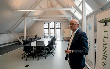  ?? PHOTO: JOSEPH JOHNSON/FAIRFAX NZ ?? Deputy pro-vice chancellor College of Arts Paul Millar in the building’s attic level seminar room. The space, which will be used for teaching, incorporat­es the original 1910 brickwork.