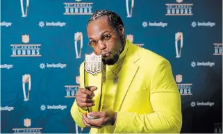  ?? CHARLIE RIEDEL THE ASSOCIATED PRESS ?? Titans 2,000-yard rusher Derrick Henry won Offensive Player of the Year on Saturday.
