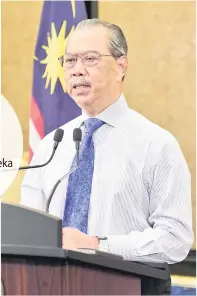  ?? — Gambar Bernama ?? TERBAHARU: Perdana Menteri Tan Sri Muhyiddin Yassin ketika mengumumka­n Program Strategik Memperkasa Rakyat dan Ekonomi (PEMERKASA) pada Rabu lalu.