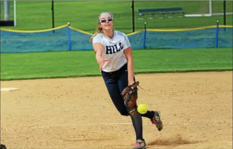  ?? SAM STEWART - DIGITAL FIRST MEDIA ?? Hill School’s Meg Dempsey delivers to the plate during the fourth inning against Lawrencevi­lle on Saturday afternoon. Below, Hannah Gallagher connects with an RBI single.