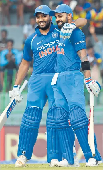  ?? AFP ?? Virat Kohli and Rohit Sharma scored 219 runs in just 29 overs to put India on the ascendency early into the fourth ODI against Sri Lanka at the Premadasa Stadium in Colombo on Thursday.
