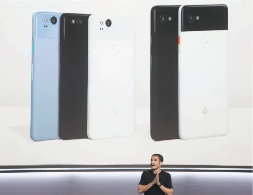  ?? Paul Chinn / The Chronicle ?? Mario Queiroz announces the Google Pixel 2 and Pixel 2 XL mobile phones, starting at $649 for the 5-inch version and $849 for the 6-inch one.