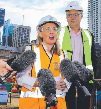  ??  ?? Tourism Industry Developmen­t Minister Kate Jones is all ears for a Gold Coast dive wreck.