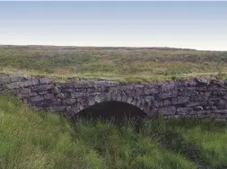  ??  ?? ABOVE LEFT “Snow, like water asleep” reads Armitage’s Snow Stone on Pule Hill ABOVE RIGHT Thieves Clough Bridge in the Colne Valley is an 18th-century packhorse crossing BELOW Standedge Tunnel is the longest canal tunnel in Britain, running 5,000m into...