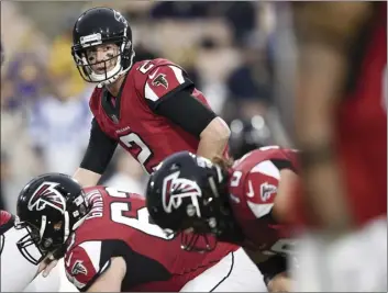  ?? AP photos ?? Matt Ryan and the Atlanta Falcons face the Eagles in an NFC divisional-round game today in Philadelph­ia. Ryan has a 1-3 record at the Linc.