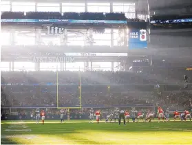  ?? BRANDON WADE/ASSOCIATED PRESS ?? Afternoon sunlight streams in from the west glass wall during the Cowboys’ home game with the Kansas City Chiefs on Nov. 5. Some players contend it’s hard to see the ball with intense glare.